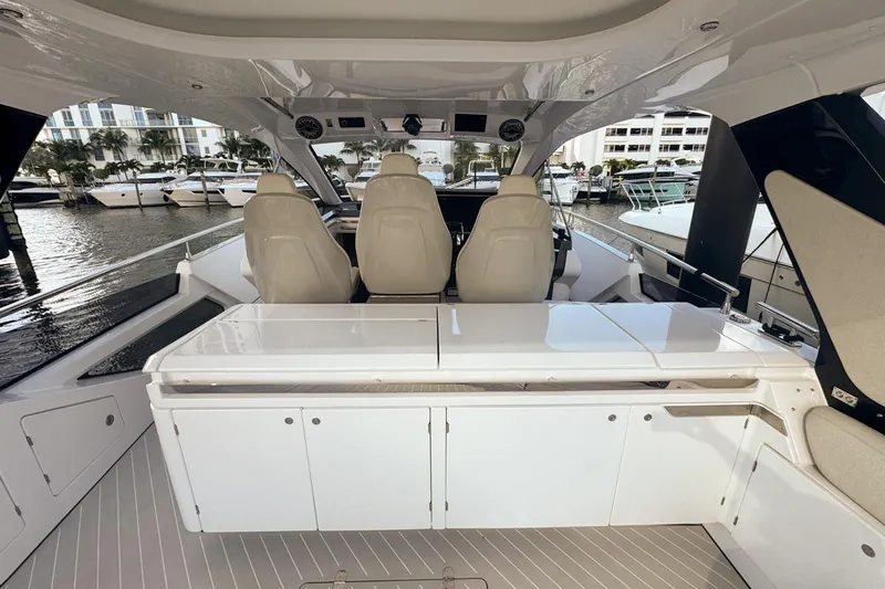 Chicken Money Yacht Photos Pics 2023 Azimut Verve 47 yacht interior with sleek seating and modern design.