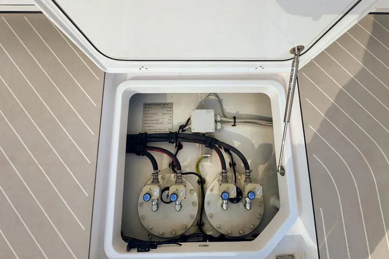 Chicken Money Yacht Photos Pics 2023 Azimut Verve 47 yacht engine compartment with visible wiring and components.