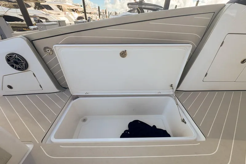 Chicken Money Yacht Photos Pics Open storage compartment on 2023 Azimut Verve 47 yacht deck.