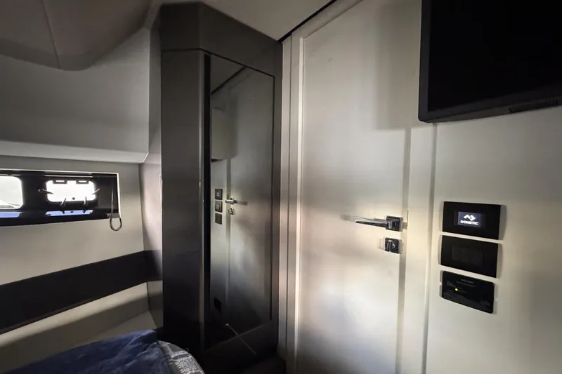Chicken Money Yacht Photos Pics Interior cabin of 2023 Azimut Verve 47 yacht, featuring modern design and sleek finishes.