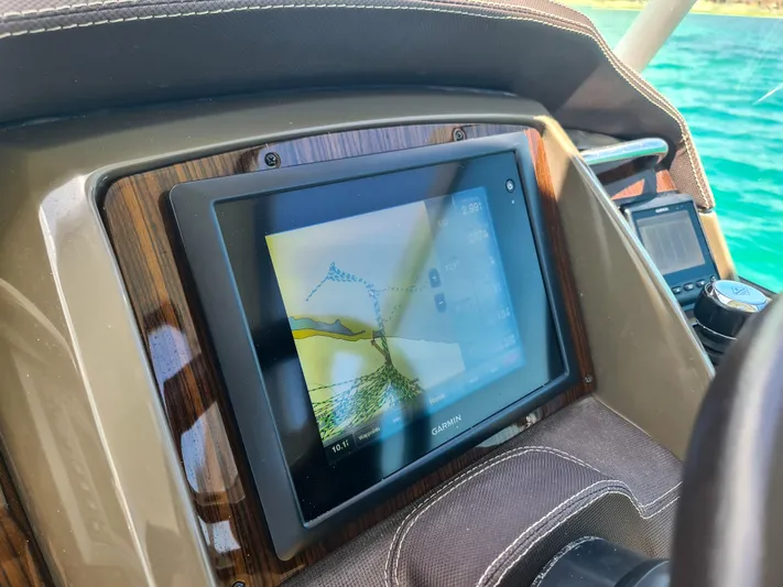  Yacht Photos Pics Garmin navigation display on 2015 Cruisers Yachts 350 Express dashboard.