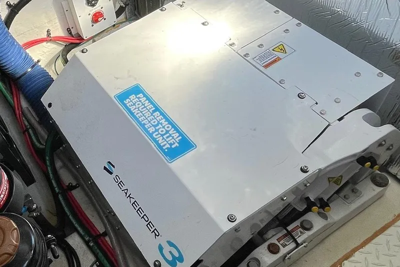  Yacht Photos Pics 2023 Cruisers Yachts 38 GLS I/O engine room with Seakeeper 3 stabilizer unit.