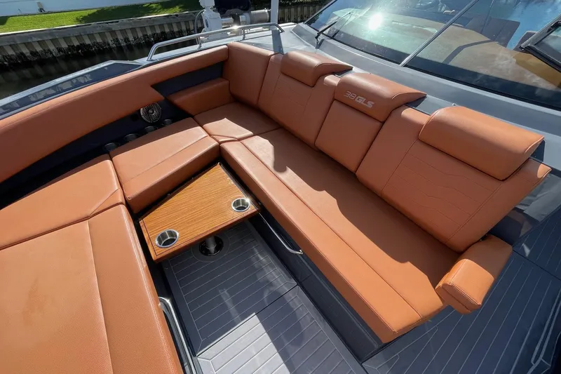  Yacht Photos Pics 2023 Cruisers Yachts 38 GLS I/O with luxurious tan seating and integrated cup holders.