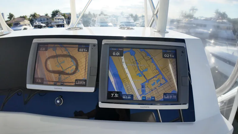  Yacht Photos Pics Navigation screens on a 1999 Viking 47 Convertible boat, displaying nautical maps.