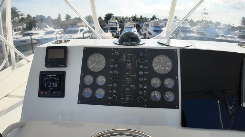  Yacht Photos Pics 1999 Viking 47 Convertible yacht dashboard with navigation instruments and gauges.