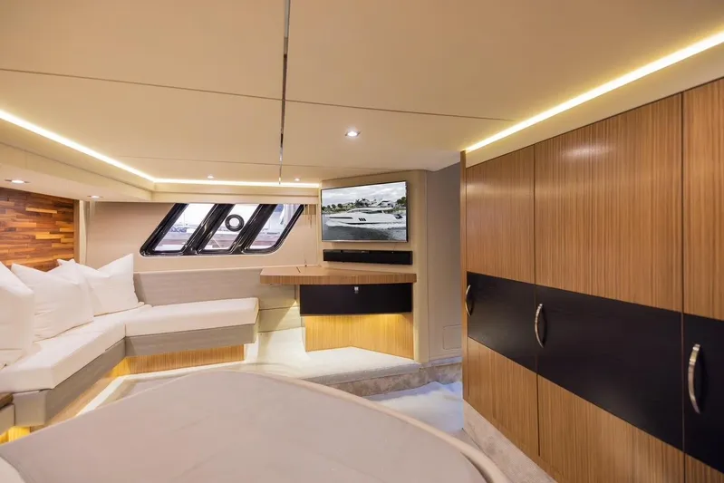 Andiamo Yacht Photos Pics Luxurious interior of 2017 Sea Ray 59 Flybridge yacht with modern furnishings and ambient lighting.
