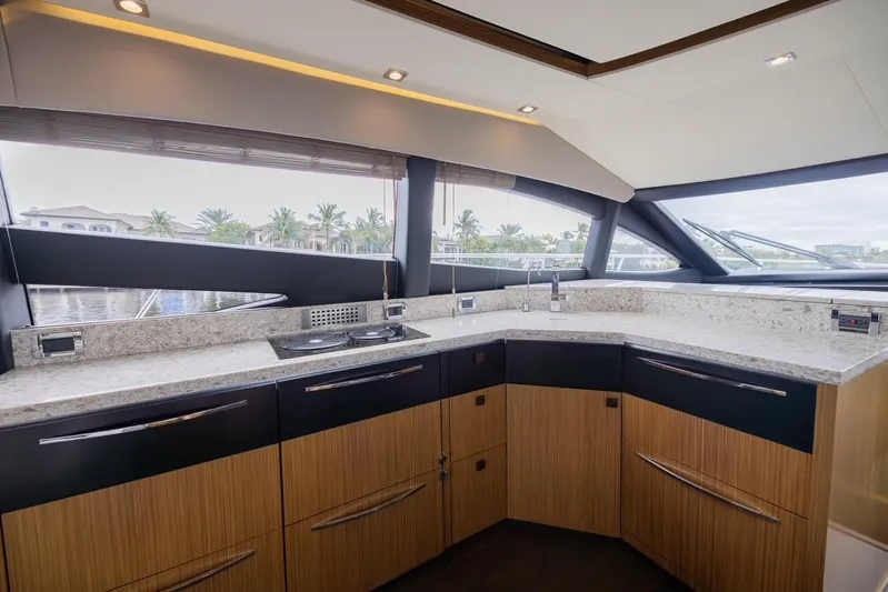 Andiamo Yacht Photos Pics Luxurious kitchen interior of 2017 Sea Ray 59 Flybridge yacht with modern design.
