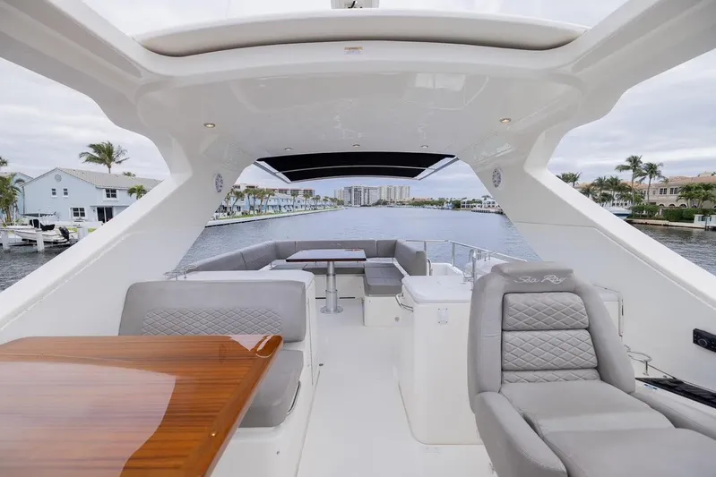 Andiamo Yacht Photos Pics 2017 Sea Ray 59 Flybridge yacht interior with luxurious seating and dining area.
