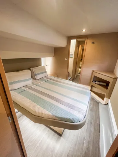  Yacht Photos Pics 2020 Fountaine Pajot MY 44 cabin with cozy bed and modern interior design.