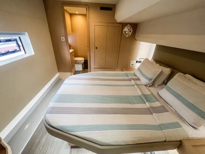  Yacht Photos Pics Luxurious cabin interior of 2020 Fountaine Pajot MY 44 yacht with ensuite bathroom.