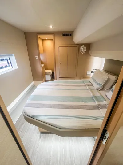  Yacht Photos Pics Cozy bedroom with ensuite bathroom in 2020 Fountaine Pajot MY 44 yacht.
