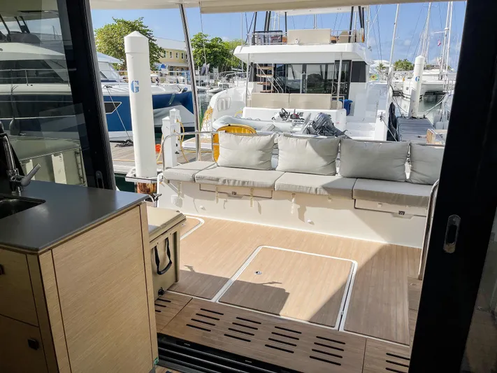  Yacht Photos Pics 2020 Fountaine Pajot MY 44 yacht interior with spacious seating and modern design.