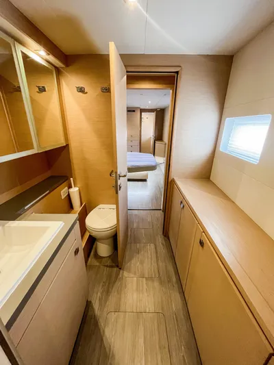  Yacht Photos Pics Luxurious bathroom interior of 2020 Fountaine Pajot MY 44 yacht, featuring modern fixtures and wood accents.