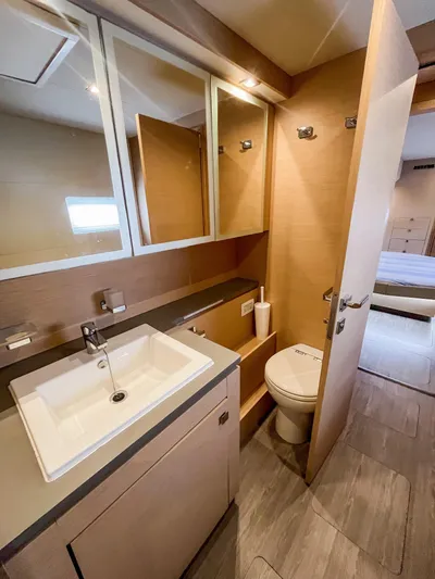  Yacht Photos Pics Modern bathroom in 2020 Fountaine Pajot MY 44 yacht with sink and toilet.