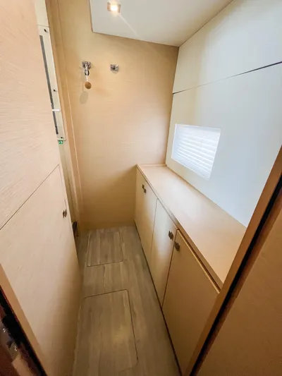  Yacht Photos Pics Interior of 2020 Fountaine Pajot MY 44 yacht, featuring sleek cabinetry and modern design.