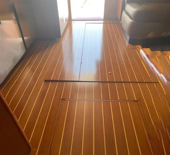  Yacht Photos Pics Polished wooden floor inside a 2005 Luhrs 36 Convertible boat.