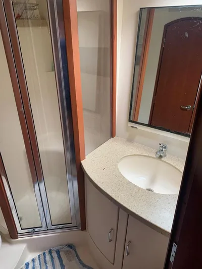  Yacht Photos Pics Bathroom interior of 2005 Luhrs 36 Convertible yacht with shower and sink.