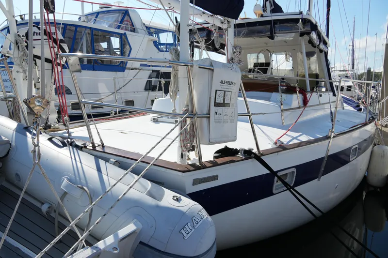 Peggy Lee Yacht Photos Pics 1984 Irwin 52 Cutter Ketch yacht docked, featuring spacious deck and rigging.