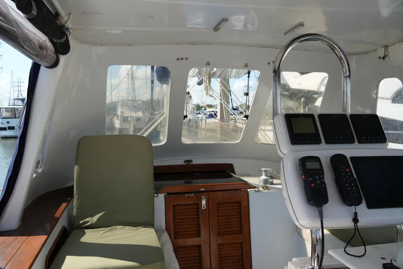 Peggy Lee Yacht Photos Pics Cockpit of 1984 Irwin 52 Cutter Ketch with navigation equipment and seating.