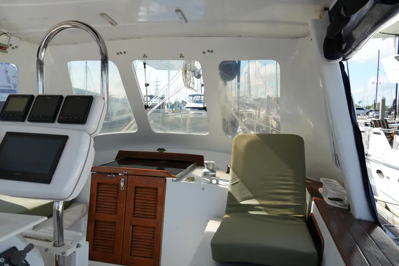 Peggy Lee Yacht Photos Pics Cockpit of 1984 Irwin 52 Cutter Ketch with navigation equipment and seating.