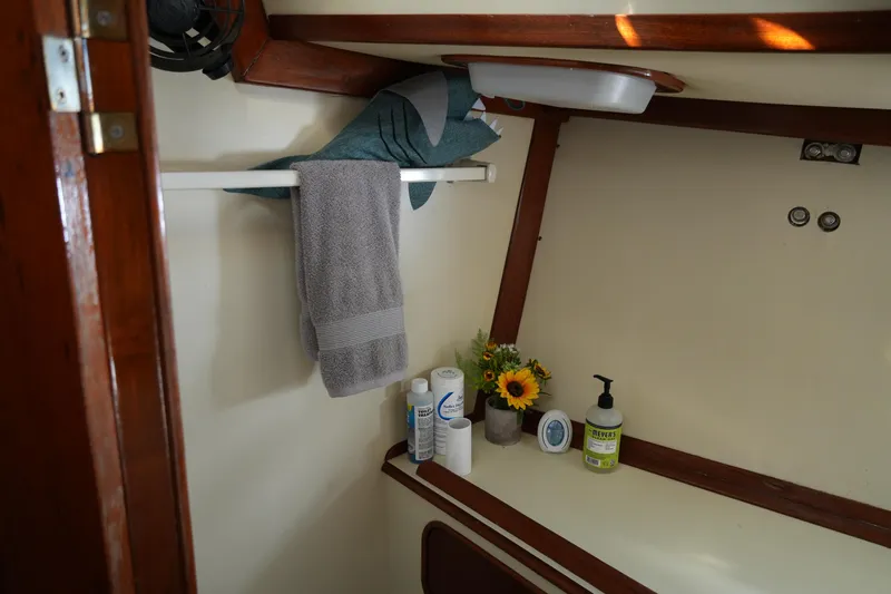 Peggy Lee Yacht Photos Pics Interior of 1984 Irwin 52 Cutter Ketch with towels and toiletries.
