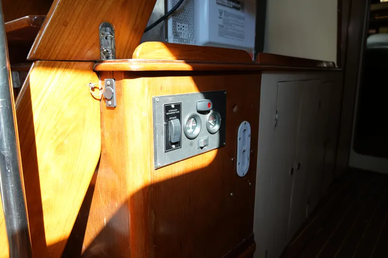 Peggy Lee Yacht Photos Pics Control panel on 1984 Irwin 52 Cutter Ketch's wooden interior.