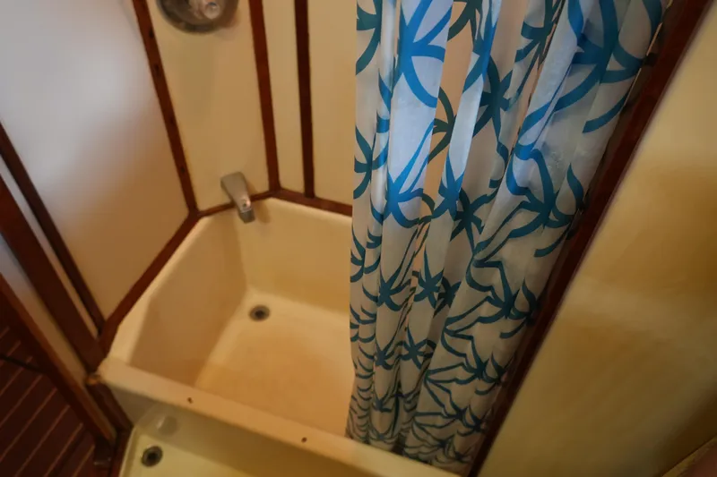 Peggy Lee Yacht Photos Pics Shower area on 1984 Irwin 52 Cutter Ketch with floral curtain.