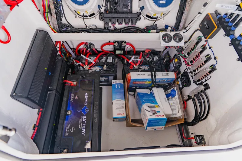  Yacht Photos Pics Electrical system of 2026 Broadwater 25 Bay Cat boat with batteries and wiring.