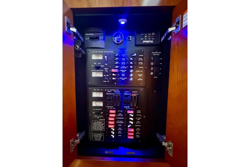  Yacht Photos Pics Electrical panel inside 2007 Cruisers Yachts 370 Express, featuring various controls and switches.