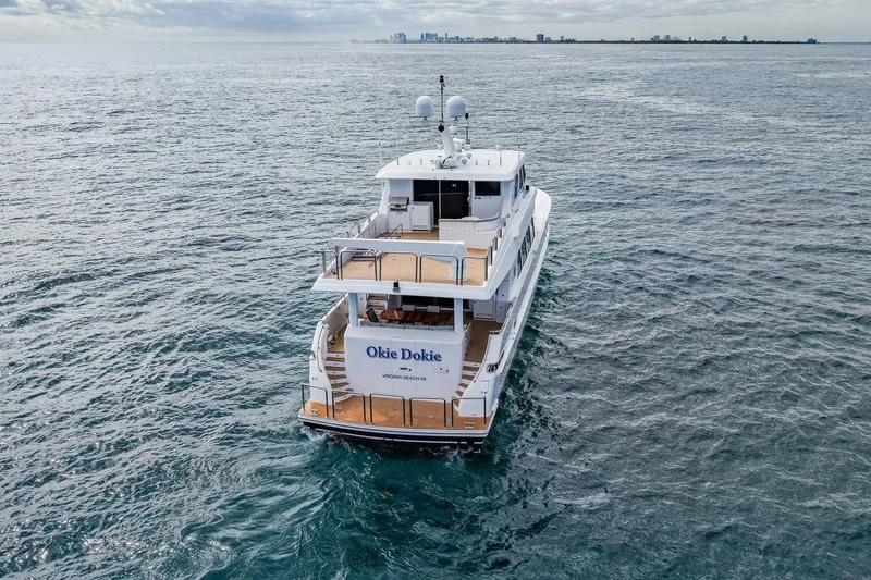 Okie Dokie Yacht Photos Pics Luxury 2009 Hargrave Enclosed Bridge yacht cruising on open sea.