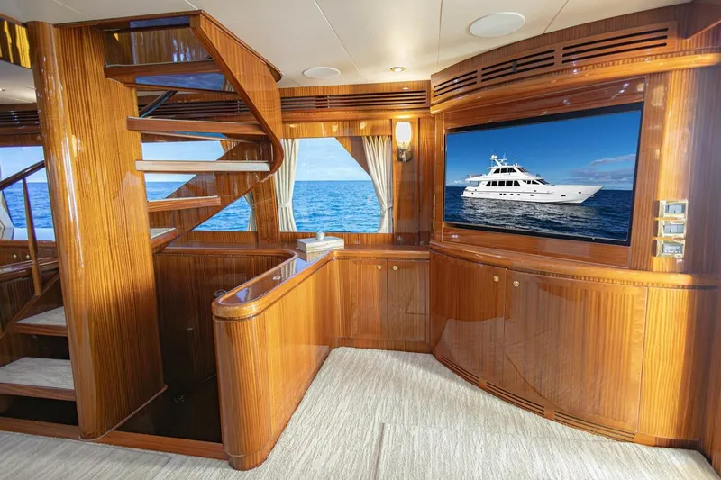 Okie Dokie Yacht Photos Pics Luxurious 2009 Hargrave Enclosed Bridge yacht interior with elegant wood finishes and staircase.