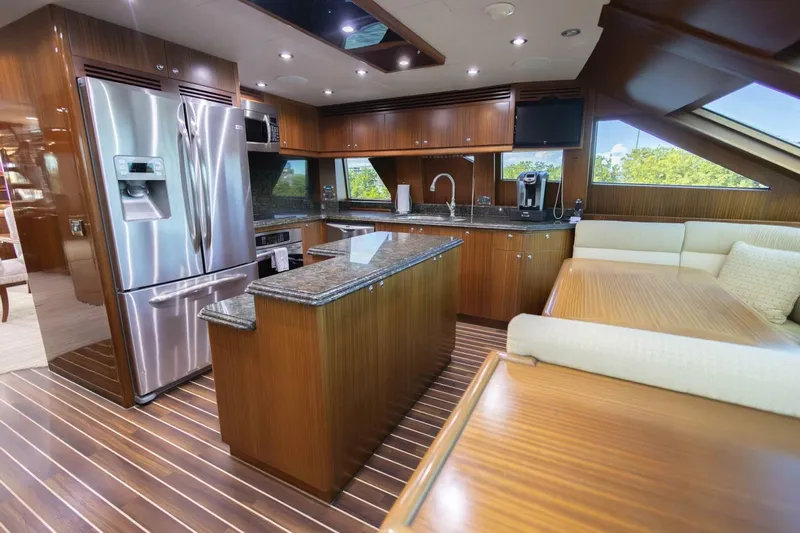 Okie Dokie Yacht Photos Pics Luxurious kitchen interior of 2009 Hargrave Enclosed Bridge yacht with modern appliances.