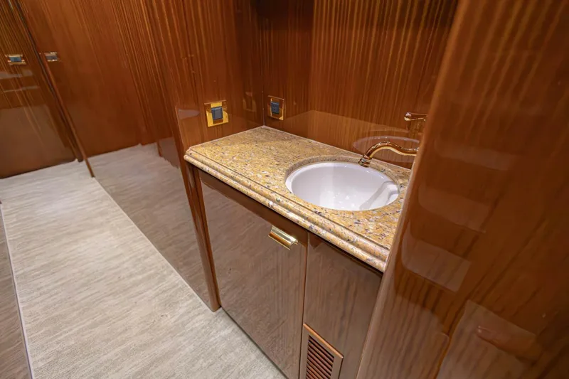 Okie Dokie Yacht Photos Pics Luxurious 2009 Hargrave Enclosed Bridge yacht bathroom with elegant wood and granite finishes.
