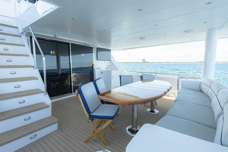 Okie Dokie Yacht Photos Pics Luxurious 2009 Hargrave Enclosed Bridge yacht deck with seating and ocean view.