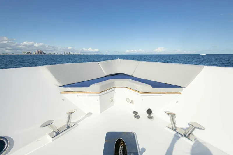 Okie Dokie Yacht Photos Pics Bow view of 2009 Hargrave Enclosed Bridge yacht with ocean and city skyline.