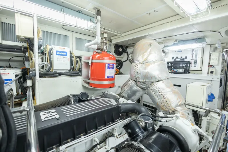 Okie Dokie Yacht Photos Pics Engine room of 2009 Hargrave Enclosed Bridge yacht with CAT engine and safety equipment.