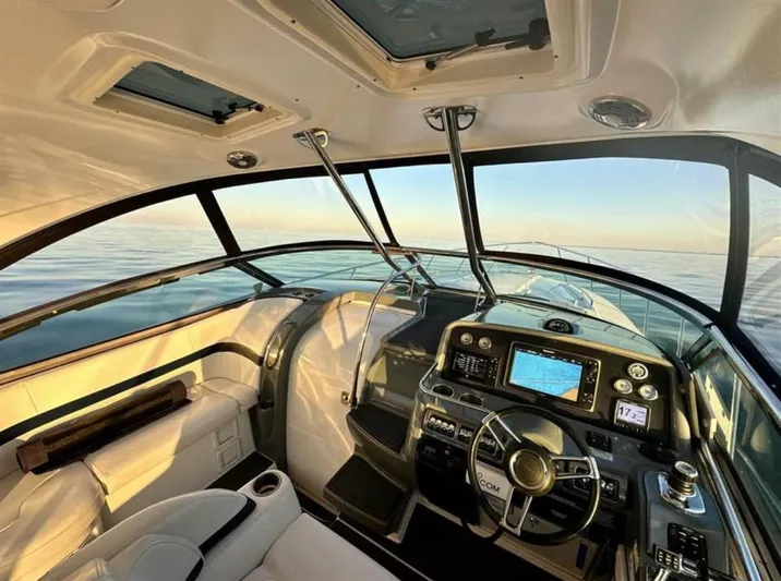  Yacht Photos Pics Interior of 2013 Formula 37 PC yacht with modern dashboard and ocean view.
