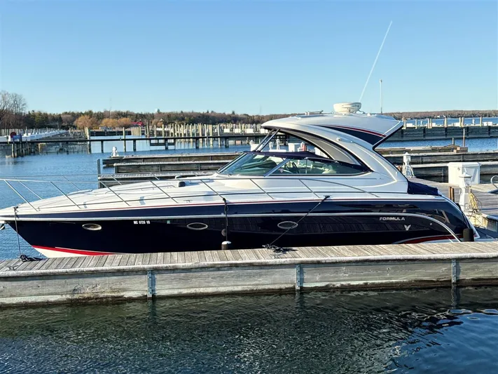  Yacht Photos Pics 2013 Formula 37 PC yacht docked at marina under clear blue sky.