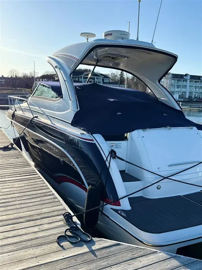  Yacht Photos Pics 2013 Formula 37 PC yacht docked at marina, covered and secured with ropes.