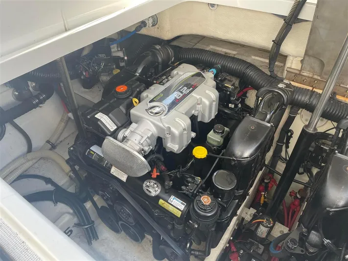  Yacht Photos Pics Engine compartment of a 2013 Formula 37 PC boat, showcasing detailed mechanical components.