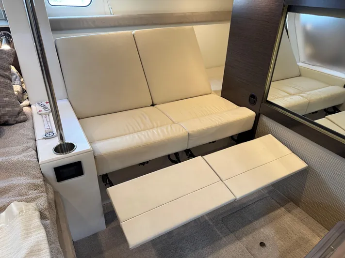  Yacht Photos Pics 2017 Cruisers Yachts 45 Cantius interior with beige seating and modern design.