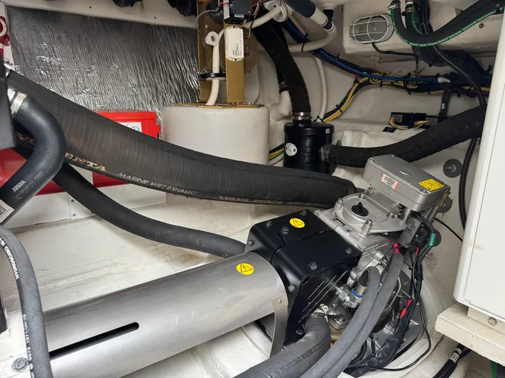  Yacht Photos Pics Engine room of 2017 Cruisers Yachts 45 Cantius with visible mechanical components.