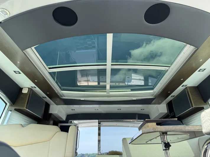  Yacht Photos Pics Interior view of 2017 Cruisers Yachts 45 Cantius with panoramic sunroof and modern design.