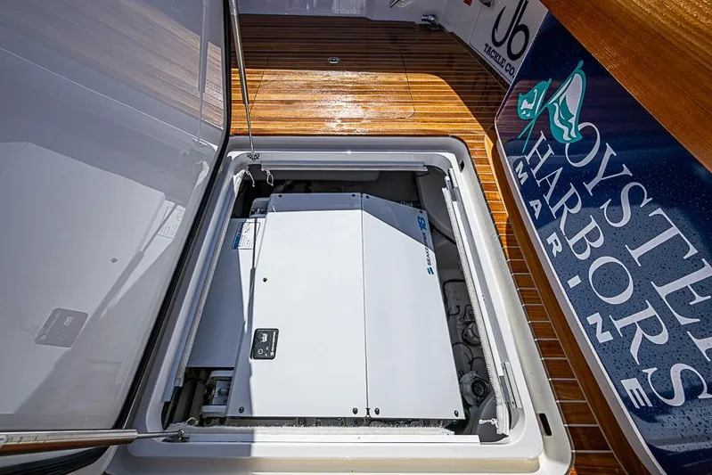 Big Stink Yacht Photos Pics Engine compartment of 2026 Viking 54 Convertible yacht, featuring Oyster Harbors Marine branding.