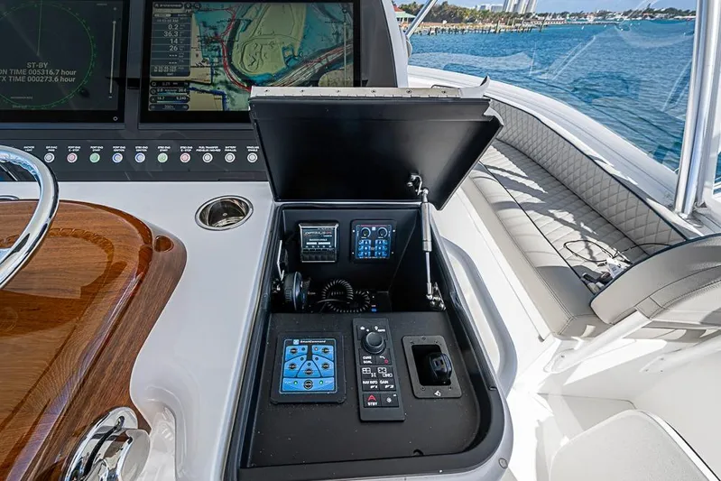 Big Stink Yacht Photos Pics 2026 Viking 54 Convertible yacht helm with advanced navigation controls and ocean view.