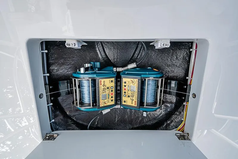 Big Stink Yacht Photos Pics 2026 Viking 54 Convertible boat equipment compartment with dual electric reels.