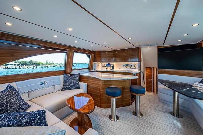 Big Stink Yacht Photos Pics Luxurious interior of 2026 Viking 54 Convertible yacht with elegant seating and modern design.