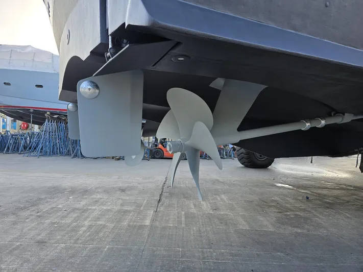 Triple Net II Yacht Photos Pics Propeller of 1994 Hatteras 82 Convertible yacht on dry dock.