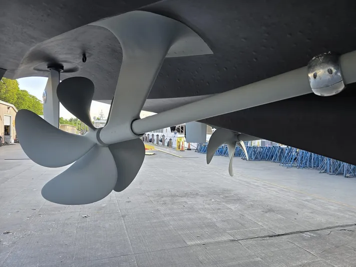 Triple Net II Yacht Photos Pics Propeller of 1994 Hatteras 82 Convertible yacht, docked for maintenance.