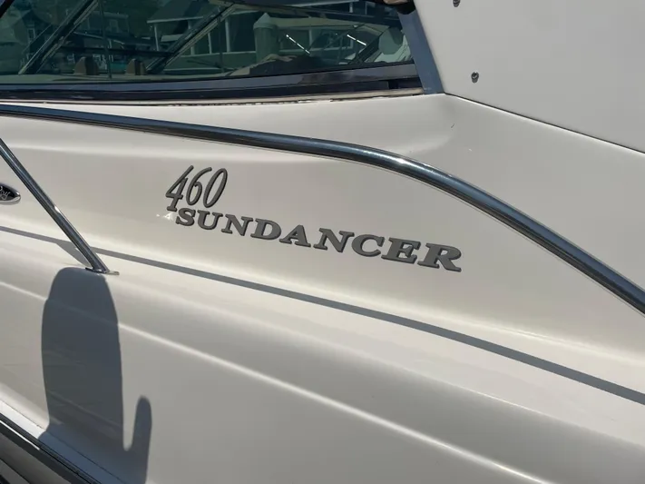 Lisa Ann Yacht Photos Pics 2003 Sea Ray 460 Sundancer boat side view with model name displayed.